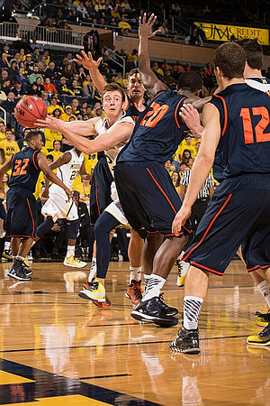 Spike Albrecht (2) and Caris LeVert (23)