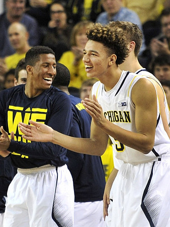 Aubrey Dawkins (24) and D.J. Wilson (5)