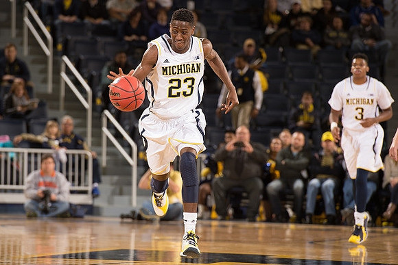 Caris LeVert (23) and Kameron Chatman (3)