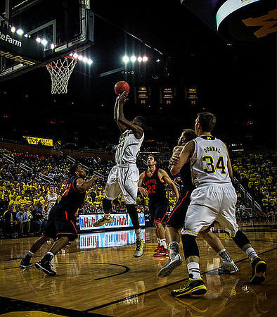 Caris LeVert (23) and Mark Donnal (34)
