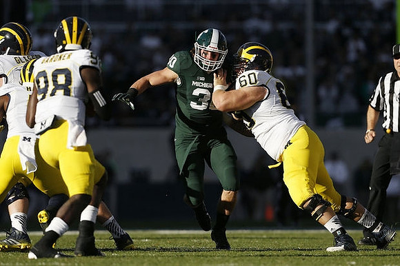 Graham Glasgow (61), Devin Gardner (98), and Jack Miller (60)
