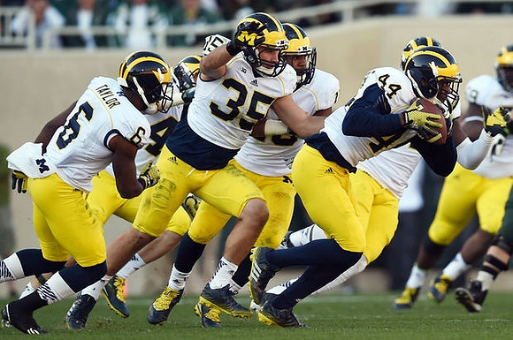 Raymon Taylor (6), Joe Bolden (35), and Delano Hill (44)