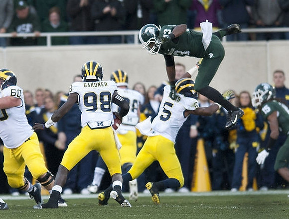 Jack Miller (60), Devin Gardner (98), and Justice Hayes (5)