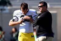Matt Wile (45) and Brady Hoke