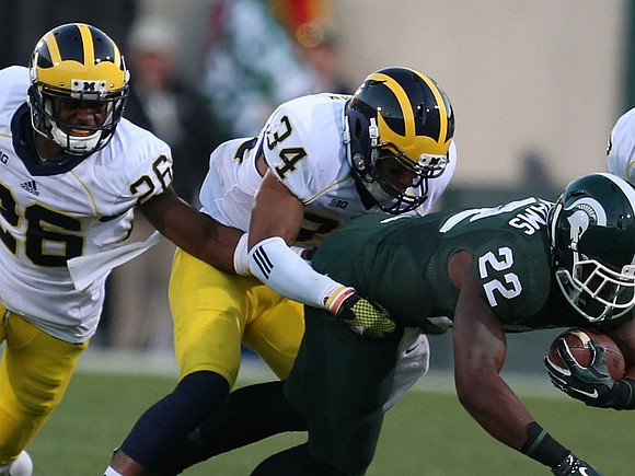 Jourdan Lewis (26) and Jeremy Clark (34)