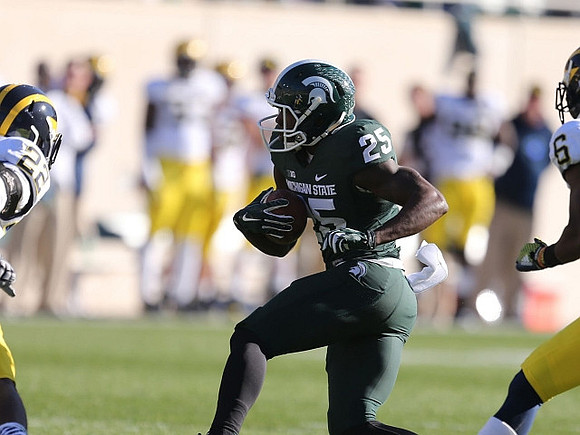 Jarrod Wilson (22) and Raymon Taylor (6)