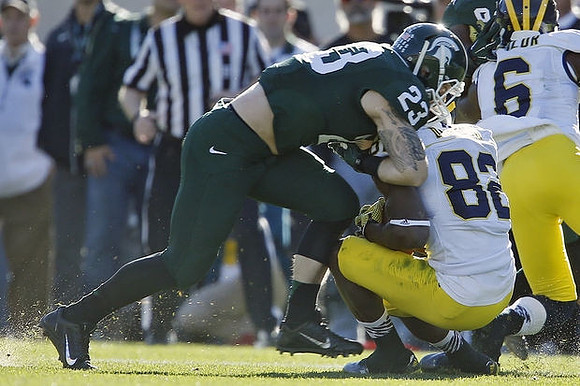 Amara Darboh (82) and Raymon Taylor (6)