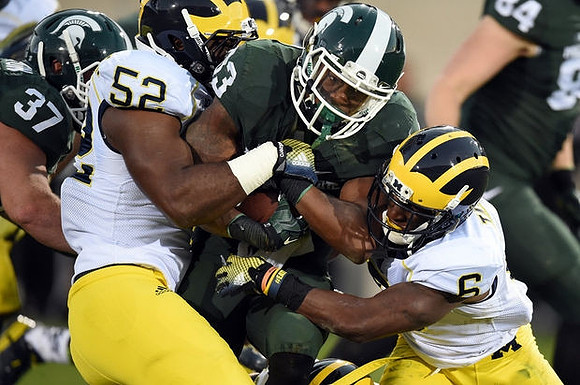 Royce Jenkins-Stone (52) and Raymon Taylor (6)