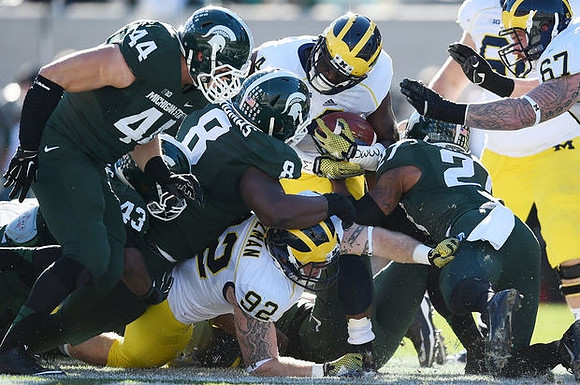 De'Veon Smith (4), Keith Heitzman (92), and Kyle Kalis (67)