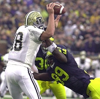 Pierre Woods (99) and Scott McClintock (36)
