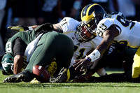 Ben Braden (71) and Devin Gardner (98)