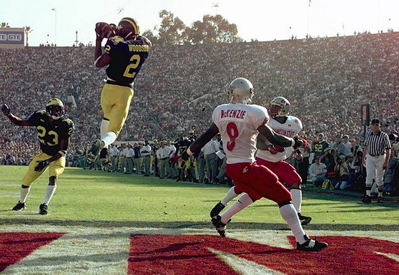Charles Woodson (2) and William Peterson (23)
