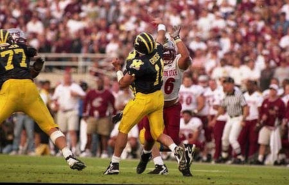 Brian Griese (14) and Jon Jansen (77)