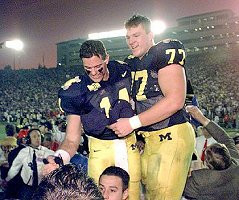 Brian Griese (14) and Jon Jansen (77)