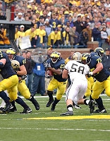 Chris Perry (23), Tony Pape (77), Matt Lentz (67), and David Baas (75)