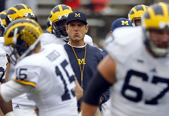 Jake Rudock (15), Jim Harbaugh, and Kyle Kalis (67)