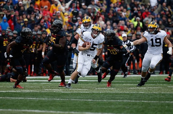 Jake Rudock (15) and Henry Poggi (19)