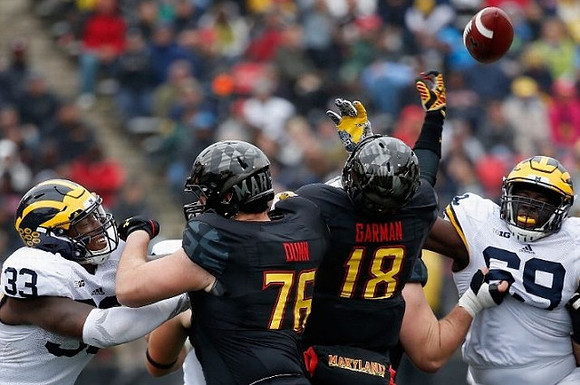 Taco Charlton (33) and Willie Henry (69)
