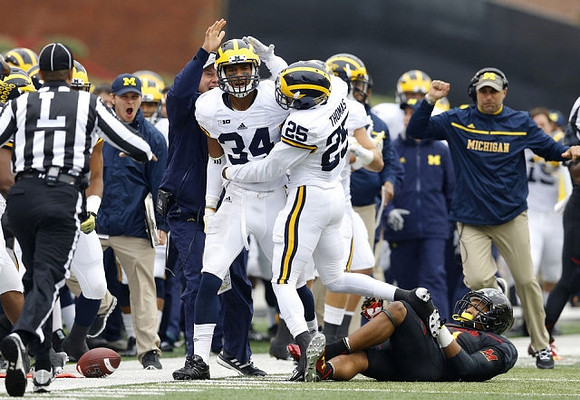 Jeremy Clark (34) and Dymonte Thomas (25)