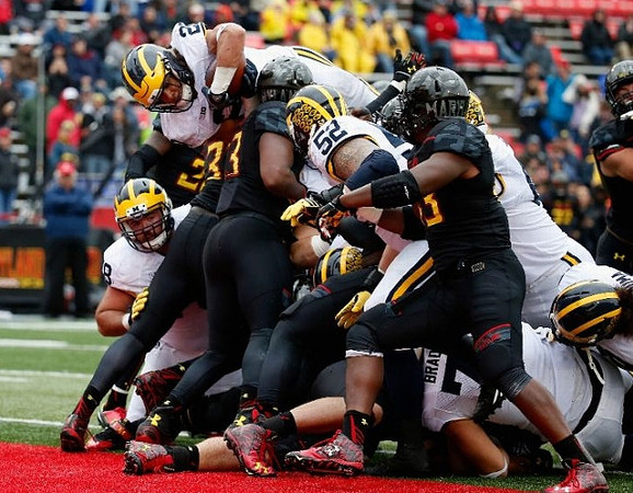 Erik Magnuson (78), Drake Johnson (20), Mason Cole (52), and Ben Braden (71)