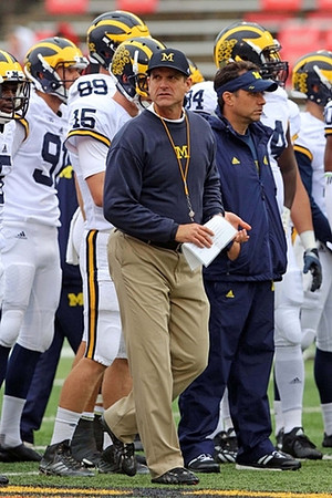 Kenny Allen (91), Jake Rudock (15), Ian Bunting (89), Jim Harbaugh, and A.J. Williams (84)