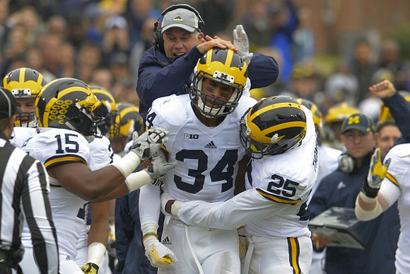 James Ross (15), Jeremy Clark (34), Dymonte Thomas (25), and D.J. Durkin
