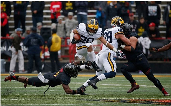 Drake Johnson (20) and Jake Butt (88)