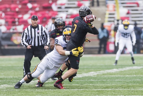 Matthew Godin (99) and Dymonte Thomas (25)