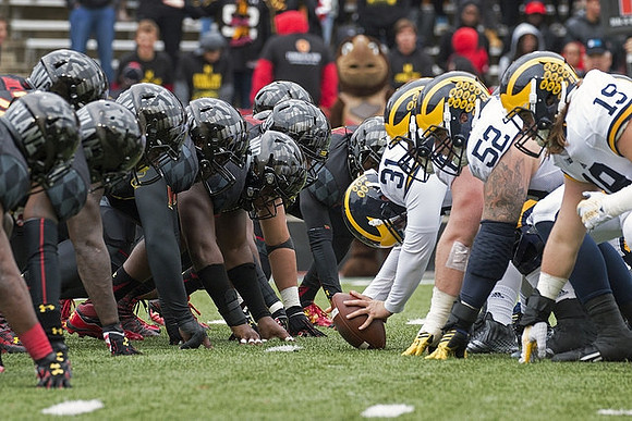 Henry Poggi (19), Mason Cole (52), and Scott Sypniewski (31)