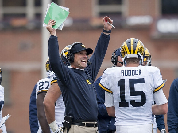 Derrick Green (27), Jim Harbaugh, and Jake Rudock (15)
