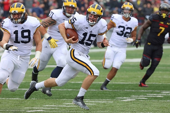 Henry Poggi (19), Ben Braden (71), Jake Rudock (15), and Ty Isaac (32)