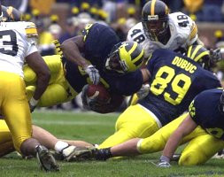 Chris Perry (23), Deitan Dubuc (89), and Bennie Joppru (83)