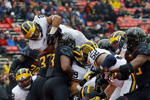 Drake Johnson (20), Erik Magnuson (78), Mason Cole (52)