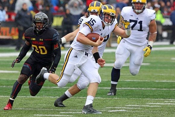 Jake Rudock (15), Henry Poggi (19), and Ben Braden (71)