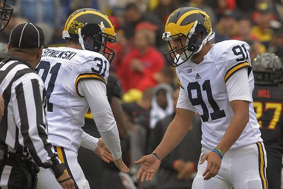 Scott Sypniewski (31) and Kenny Allen (91)