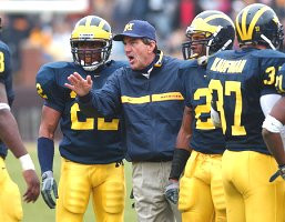 Lloyd Carr,  Jon Shaw (22),  Cato June (2), and Zach Kaufman (37)