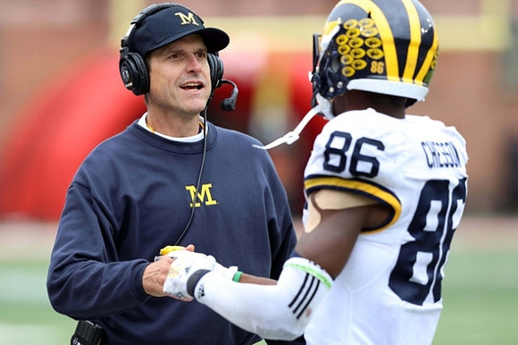 Jim Harbaugh and Jehu Chesson (86)