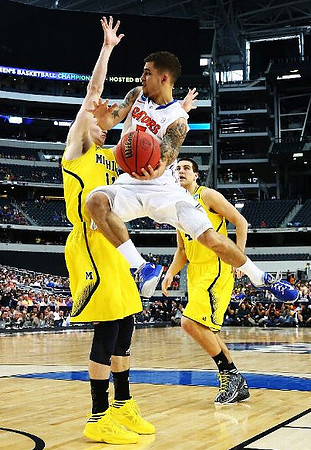 Nik Stauskas (11) and Mitch McGary (4)