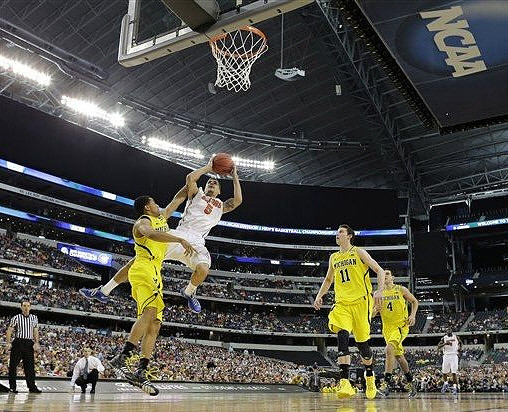 Trey Burke (3), Nik Stauskas (11), and Mitch McGary (4)