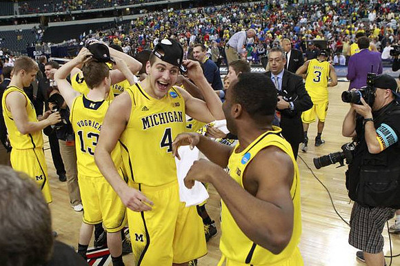 Max Bielfeldt (44), Matt Vogrich (13), Mitch McGary (4), Eso Akunne (5), and Trey Burke (3)