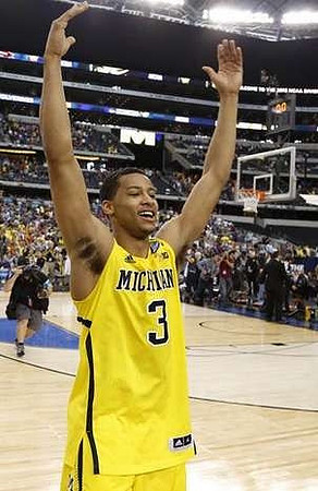 Blake McLimans (22), Matt Vogrich (13), Eso Akunne (5), Corey Person (32), and Spike Albrecht (2)