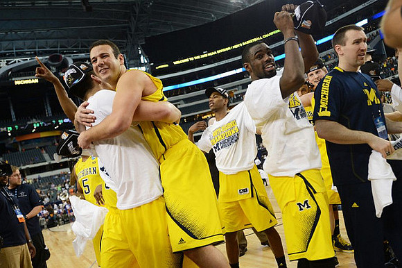 Eso Akunne (5),  Josh Bartelstein (20), Trey Burke (3), and Tim Hardaway Jr. (10)