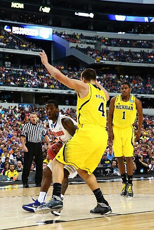 Mitch McGary (4) and Glenn Robinson III (1)
