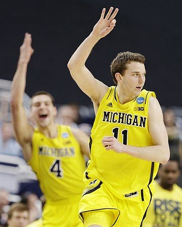 Mitch McGary (4) and Nik Stauskas (11)