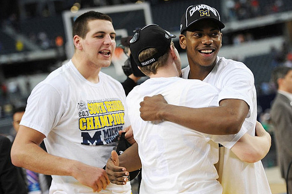 Mitch McGary (4) and Glenn Robinson III (1)