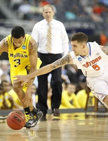 Glenn Robinson III (1) and Tim Hardaway Jr. (10)