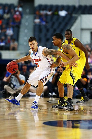 Trey Burke (3) and Tim Hardaway Jr. (10)