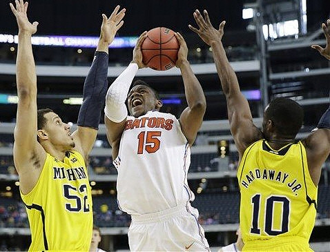 Jordan Morgan (52) and Tim Hardaway Jr. (10)