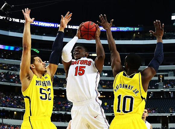 Jordan Morgan (52) and Tim Hardaway Jr. (10)