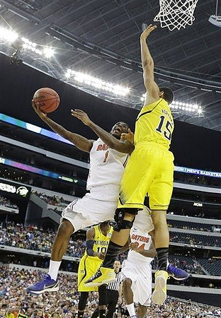 Jon Horford (15) and Tim Hardaway Jr. (10)